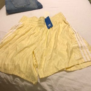 Brand new With tags yellow Adidas satin short size medium